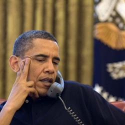 Obama Ordering a Pizza (on the phone) meme generator